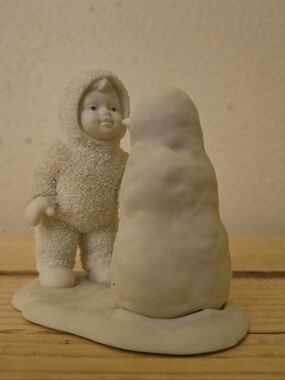 Ivory Snow Baby Figurine with Snowbank. Snowman